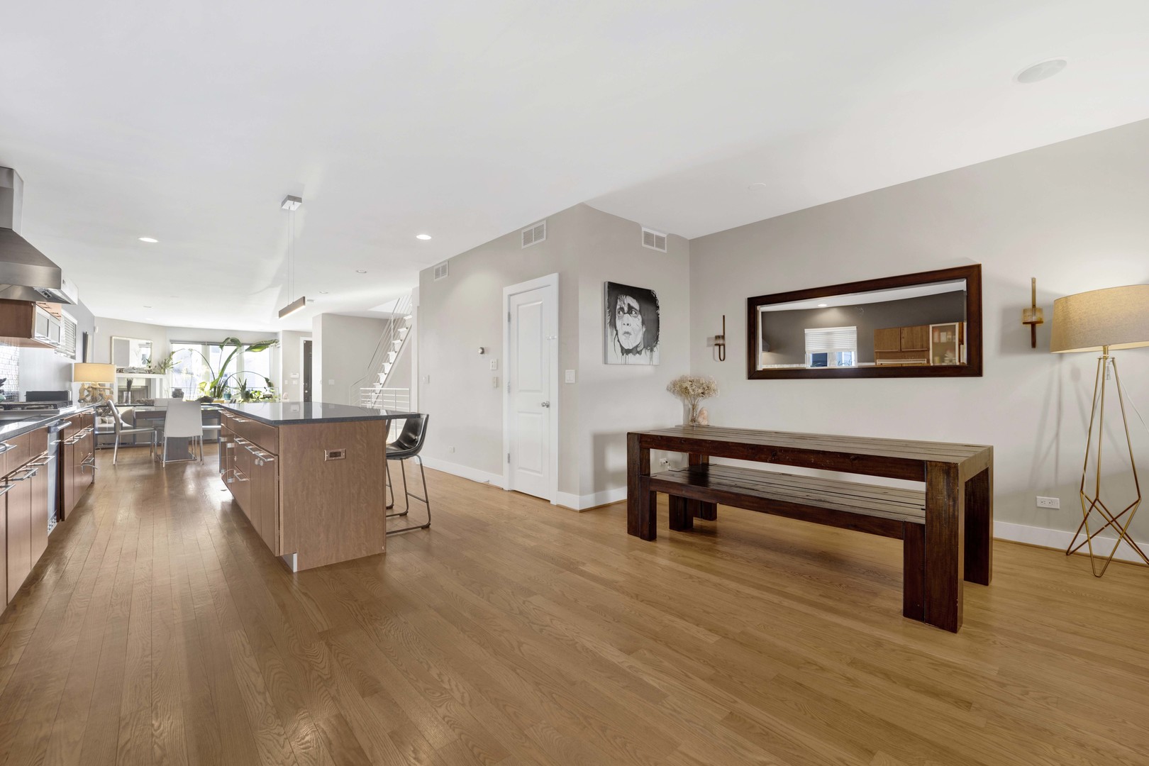 2648 West Homer Street Chicago, IL 60647 - Photo 17 of 49 a living room with furniture and a wooden floor