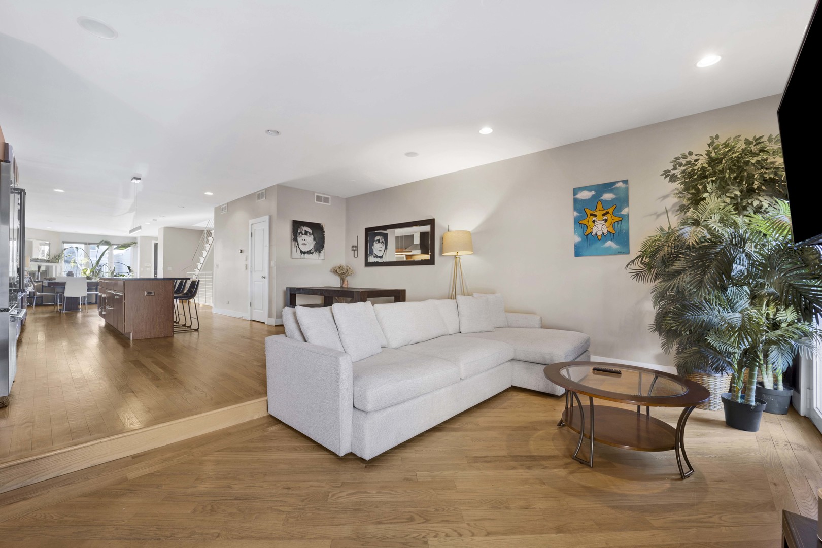 2648 West Homer Street Chicago, IL 60647 - Photo 19 of 49 a living room with furniture and a potted plant