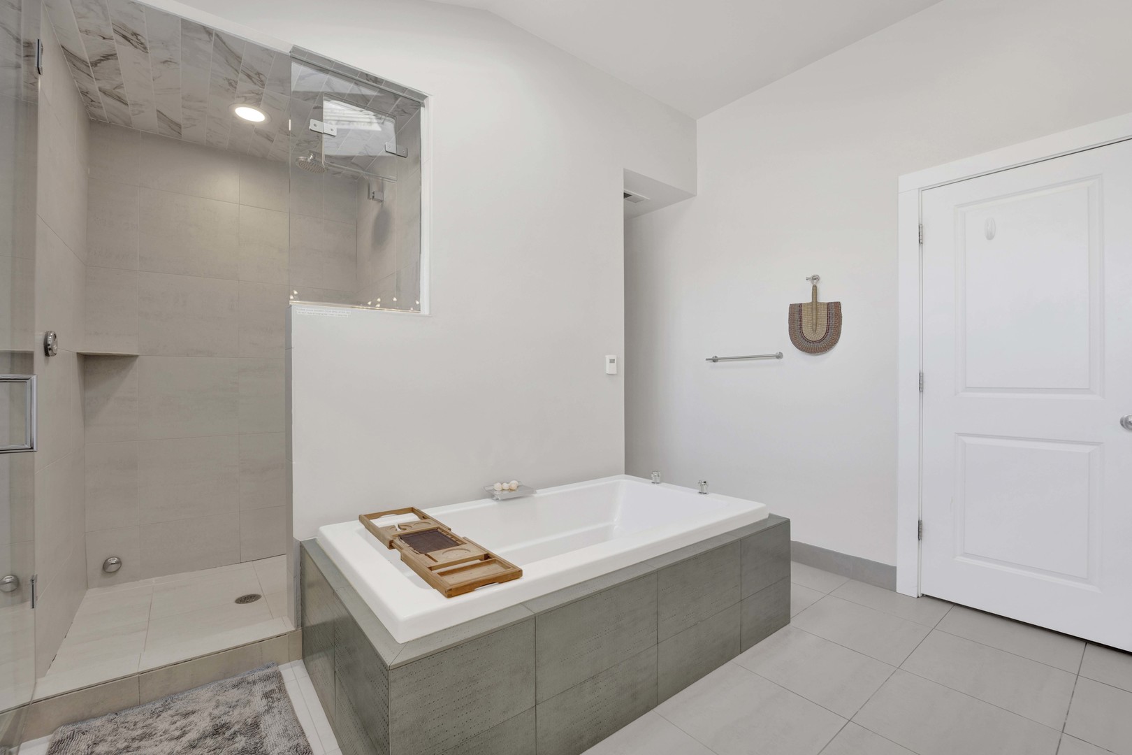 2648 West Homer Street Chicago, IL 60647 - Photo 28 of 49 a bathroom with a bathtub and a shower