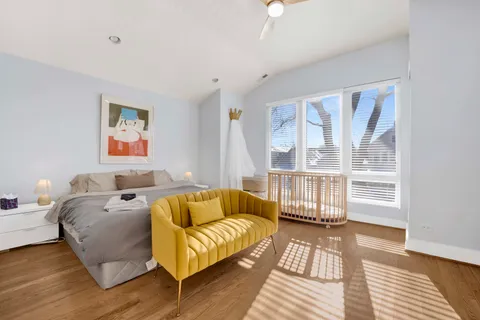 a bathroom with a bathtub and a window