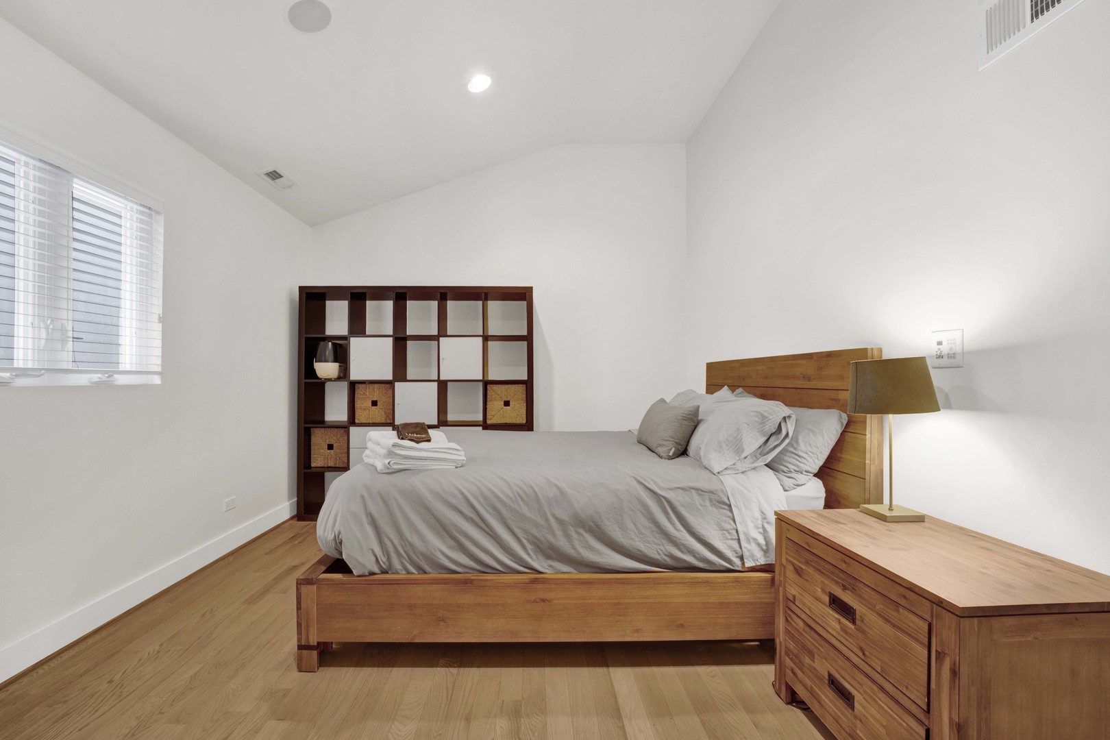 2648 West Homer Street Chicago, IL 60647 - Photo 35 of 49 a bedroom with a bed and a window