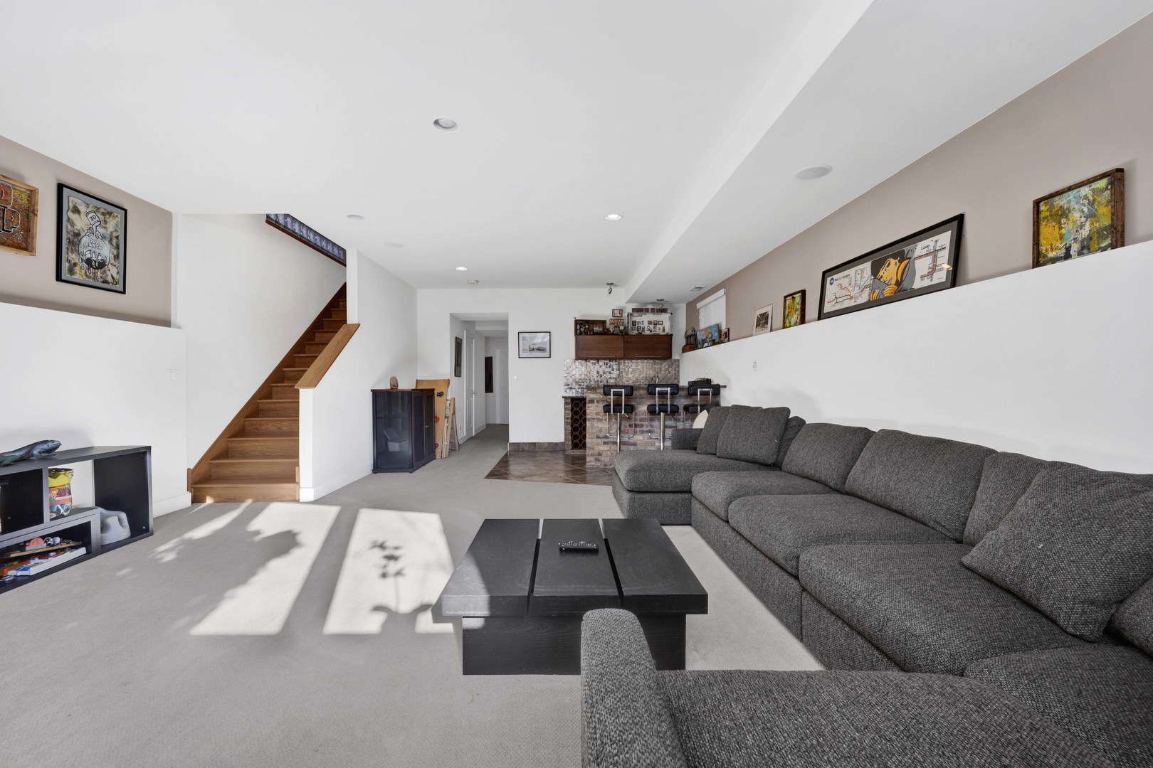 2648 West Homer Street Chicago, IL 60647 - Photo 38 of 49 a living room with furniture and wooden floor