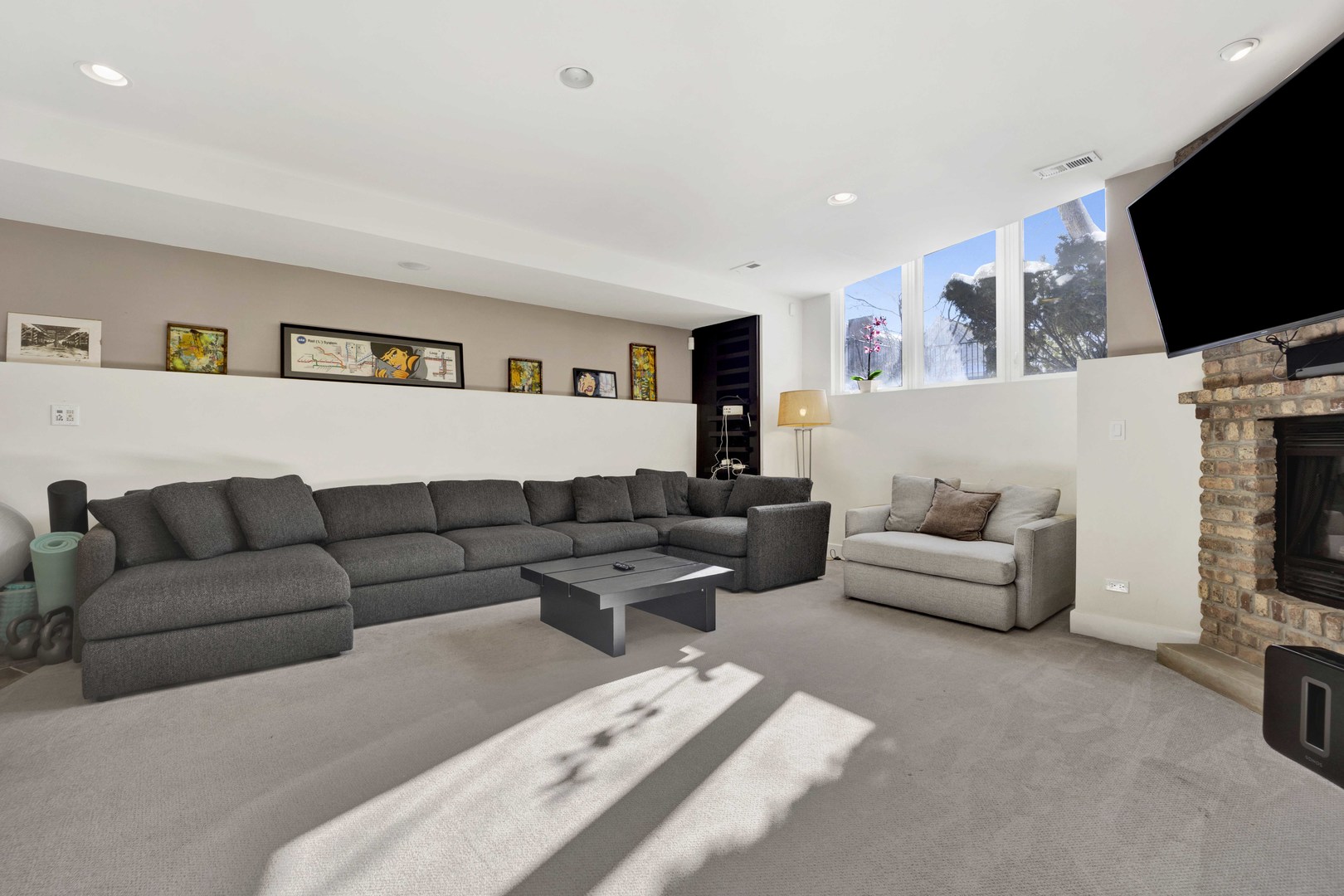 2648 West Homer Street Chicago, IL 60647 - Photo 40 of 49 a living room with furniture and a flat screen tv