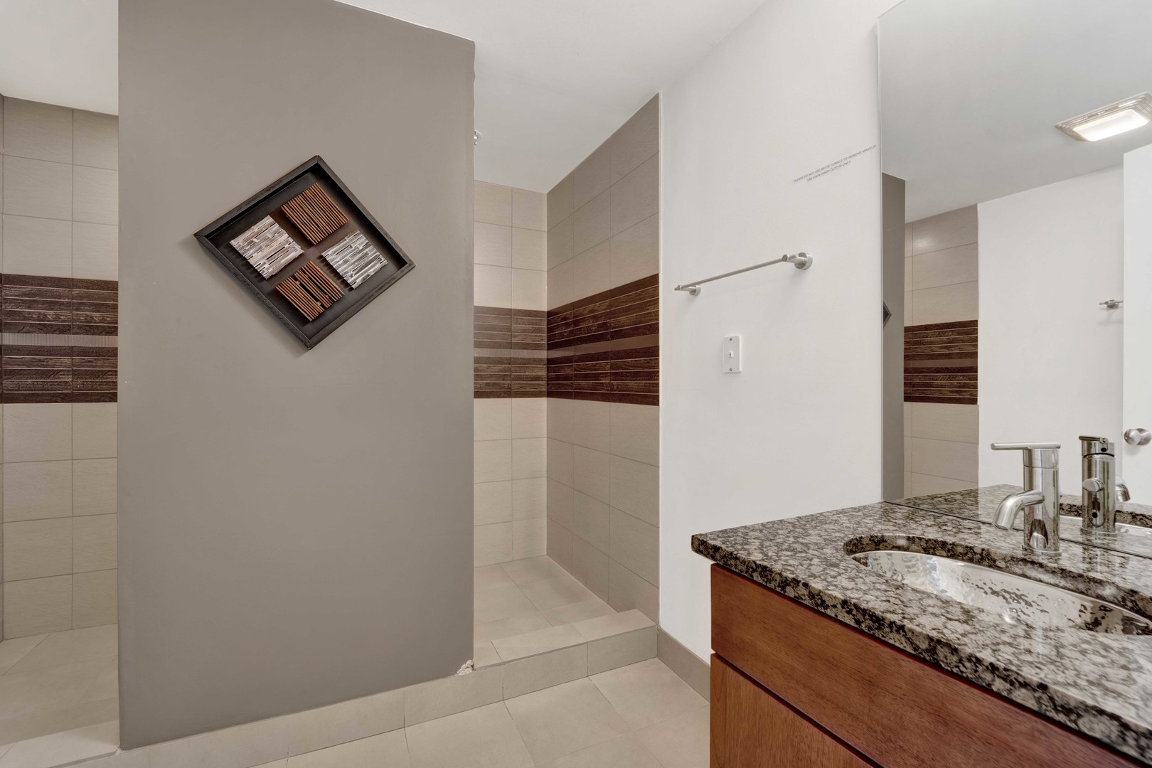 2648 West Homer Street Chicago, IL 60647 - Photo 41 of 49 a kitchen with a granite countertop sink and a refrigerator