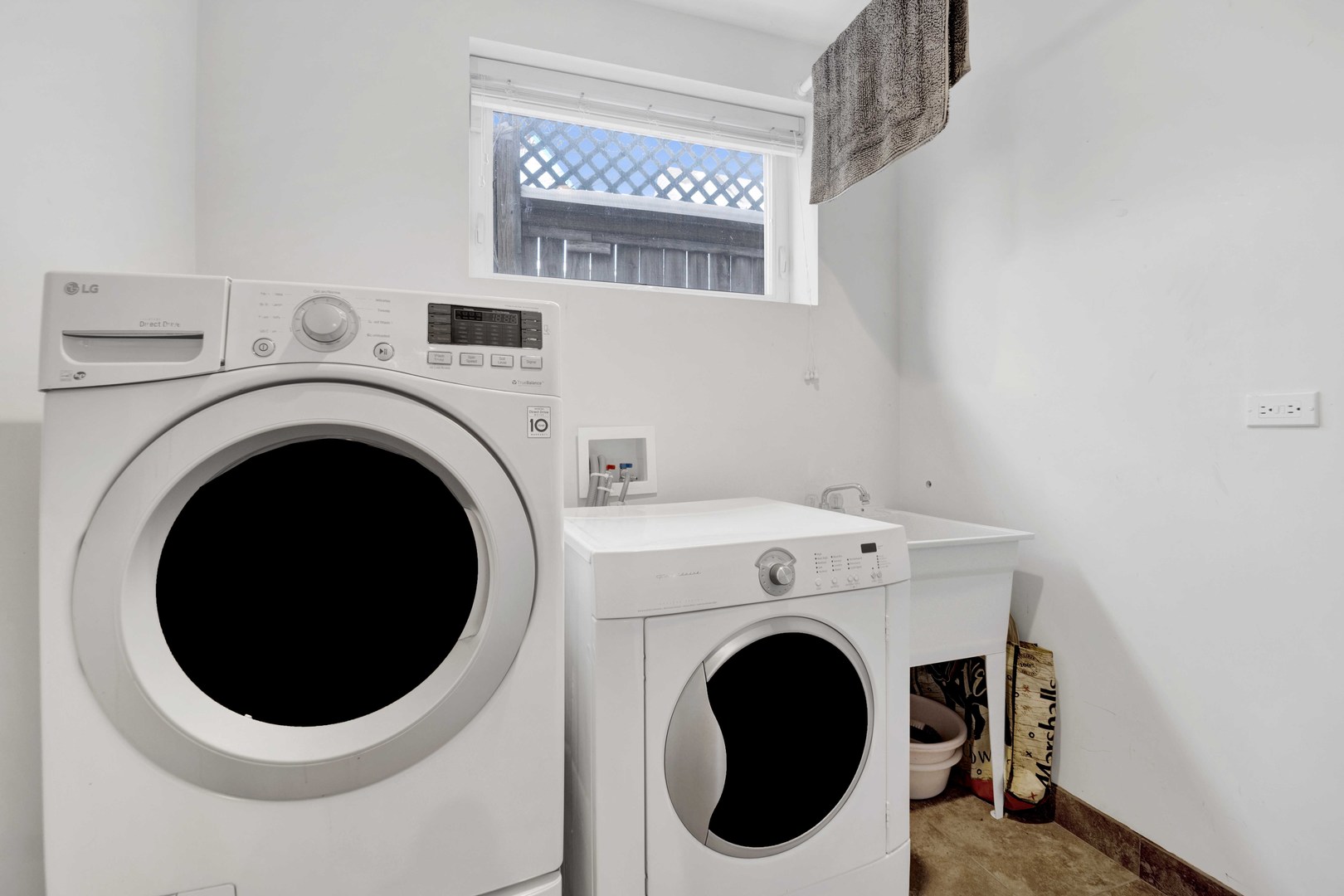 2648 West Homer Street Chicago, IL 60647 - Photo 43 of 49 a close up view of a washer and dryer