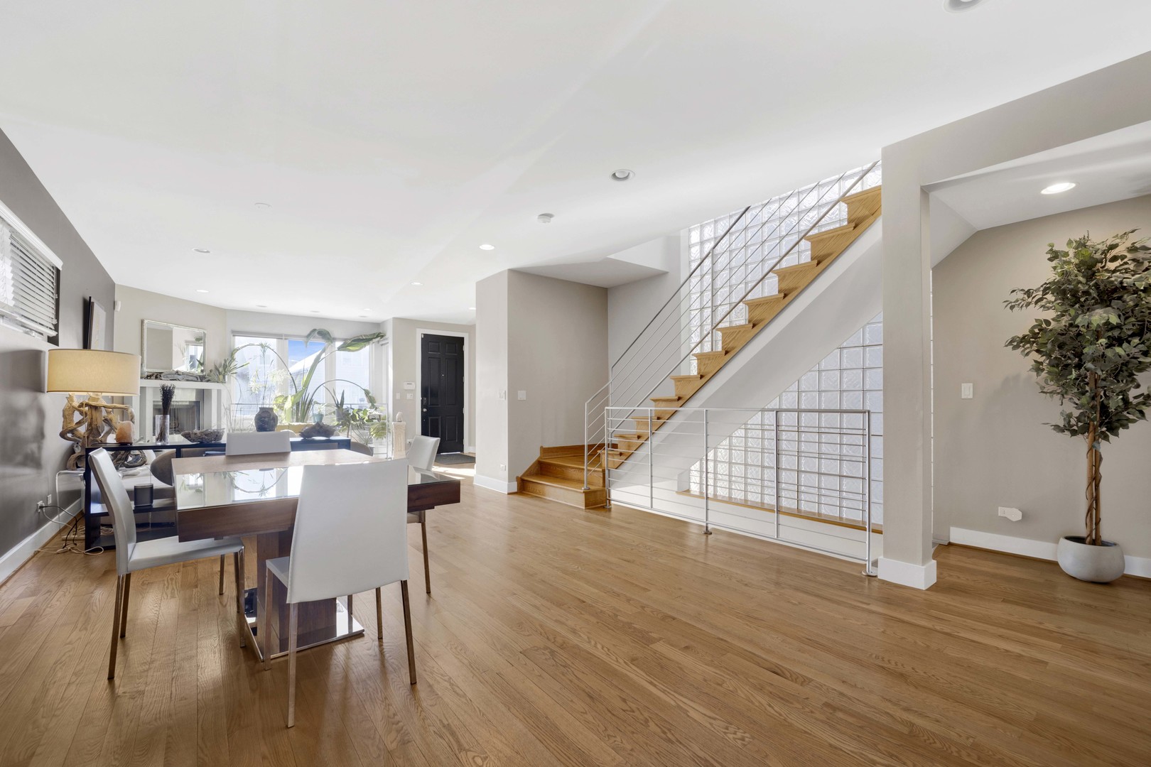 2648 West Homer Street Chicago, IL 60647 - Photo 10 of 49 a view of a dining room with furniture and wooden floor
