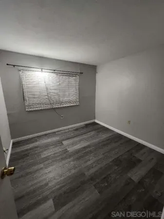 a bathroom with a toilet a sink and a shower