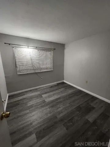 a bathroom with a toilet a sink and a shower