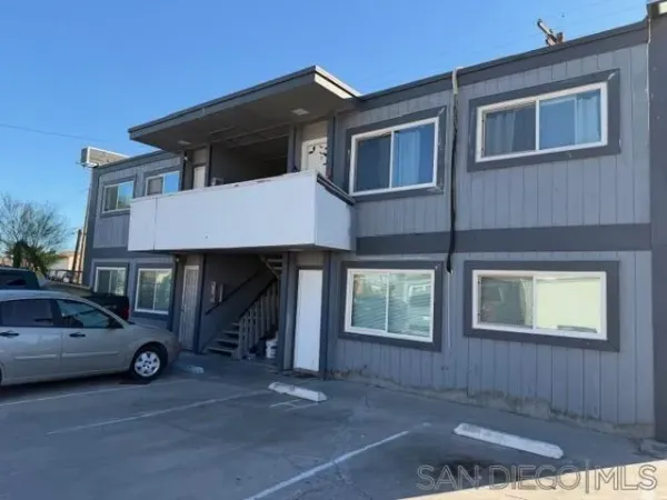 a car parked in front of a house