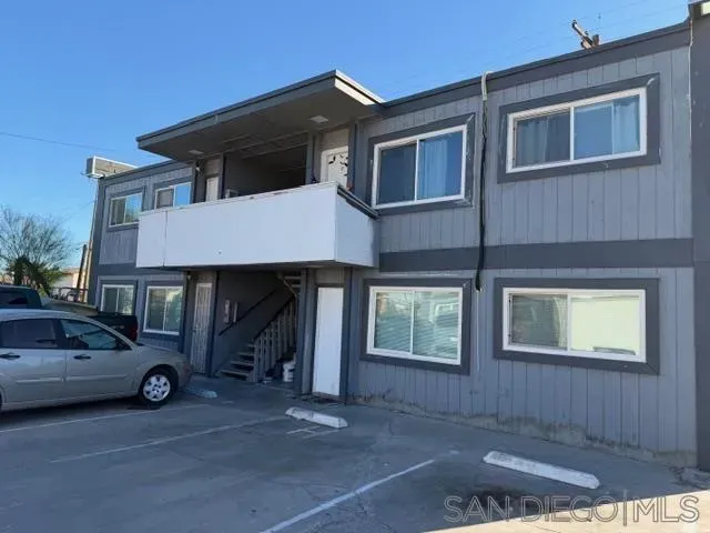 a car parked in front of a house