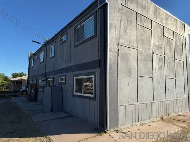 a view of parking with cars parked