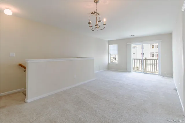 a view of a livingroom with a chandelier