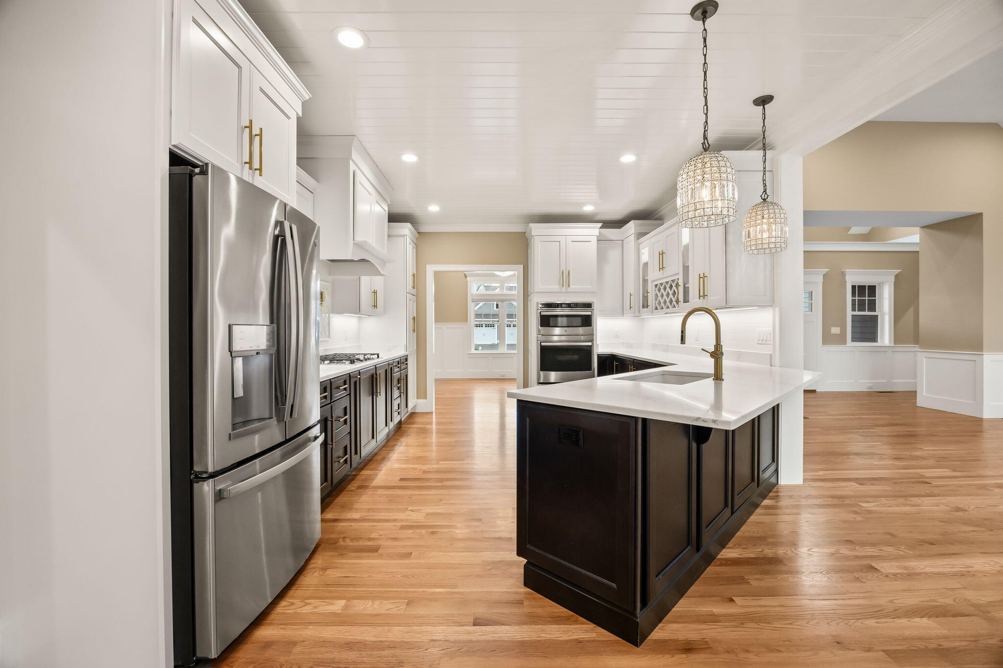 7 Nicklaus Way Mashpee, MA 02649 - Photo 12 of 45 a kitchen with stainless steel appliances granite countertop a refrigerator and a sink