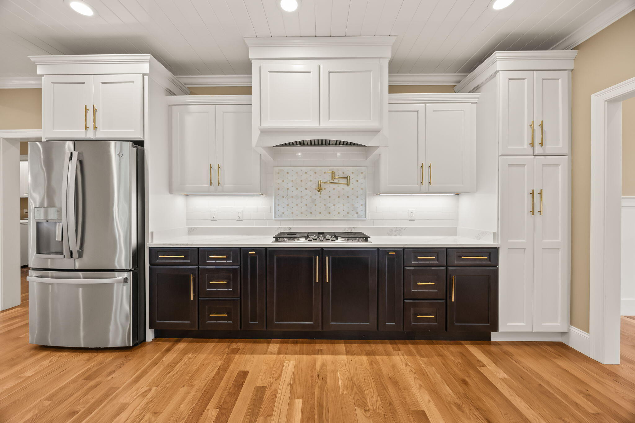 7 Nicklaus Way Mashpee, MA 02649 - Photo 16 of 45 a kitchen with stainless steel appliances granite countertop a refrigerator and a stove