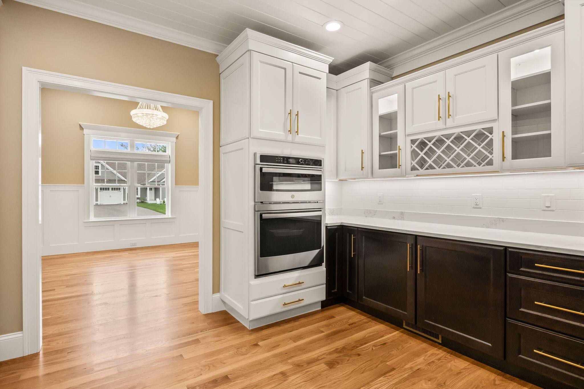 7 Nicklaus Way Mashpee, MA 02649 - Photo 17 of 45 a kitchen with granite countertop cabinets and oven