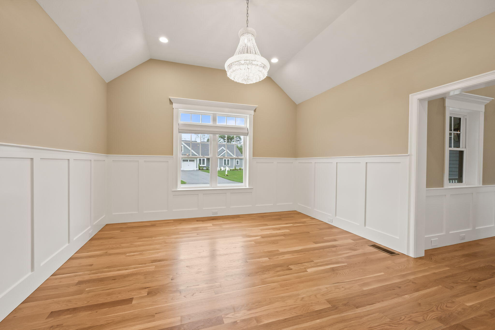 7 Nicklaus Way Mashpee, MA 02649 - Photo 18 of 45 a view of an empty room with wooden floor and a window