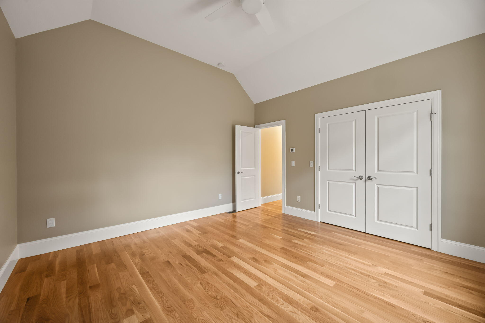 7 Nicklaus Way Mashpee, MA 02649 - Photo 24 of 45 a view of an empty room and wooden floor
