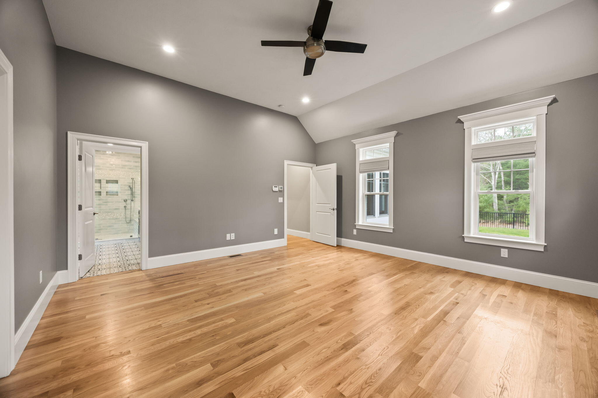 7 Nicklaus Way Mashpee, MA 02649 - Photo 28 of 45 a view of an empty room with window and a kitchen