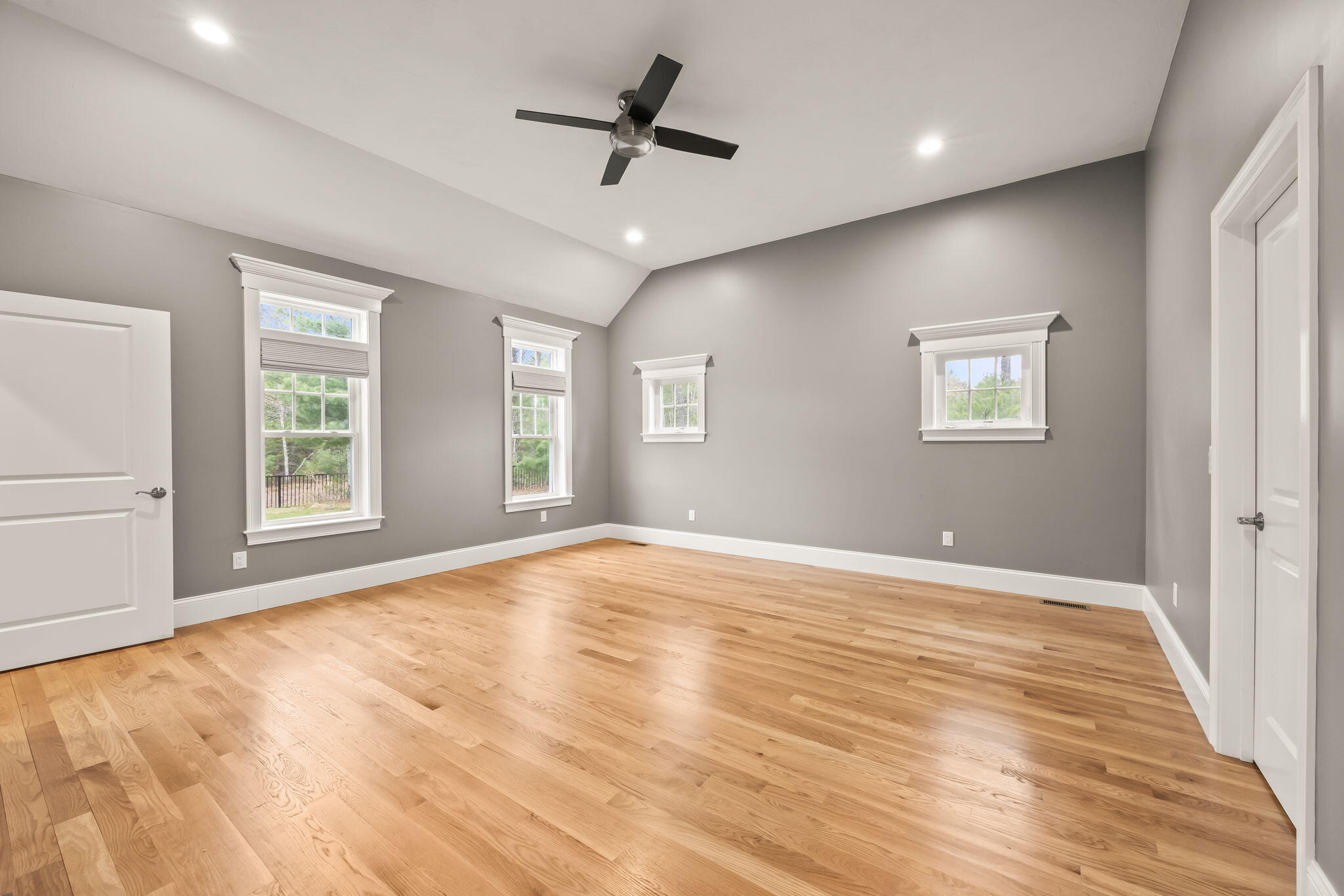 7 Nicklaus Way Mashpee, MA 02649 - Photo 29 of 45 a view of an empty room with a window and wooden floor