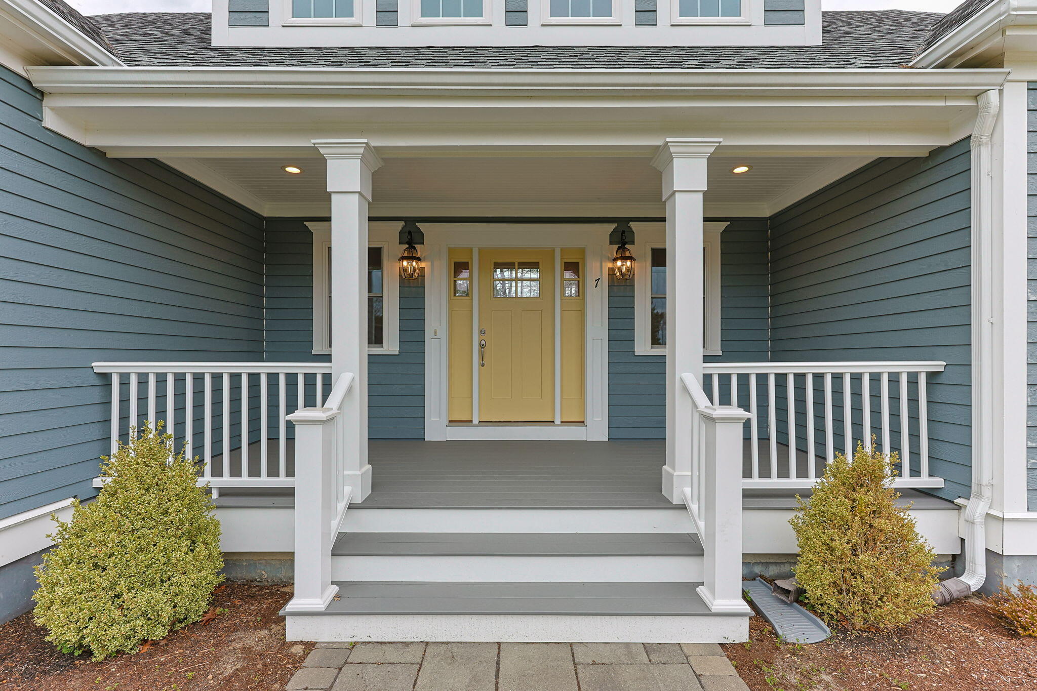 7 Nicklaus Way Mashpee, MA 02649 - Photo 3 of 45 a view of porch with a bench