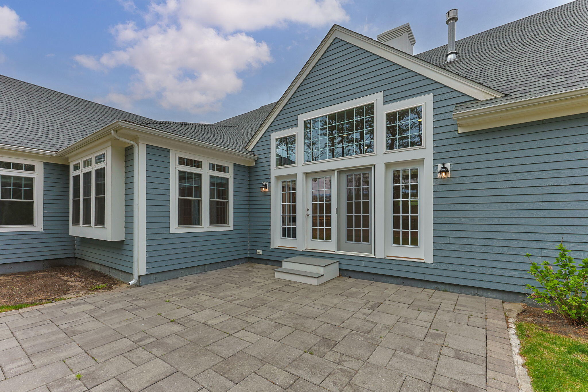 7 Nicklaus Way Mashpee, MA 02649 - Photo 36 of 45 a front view of a house with a yard