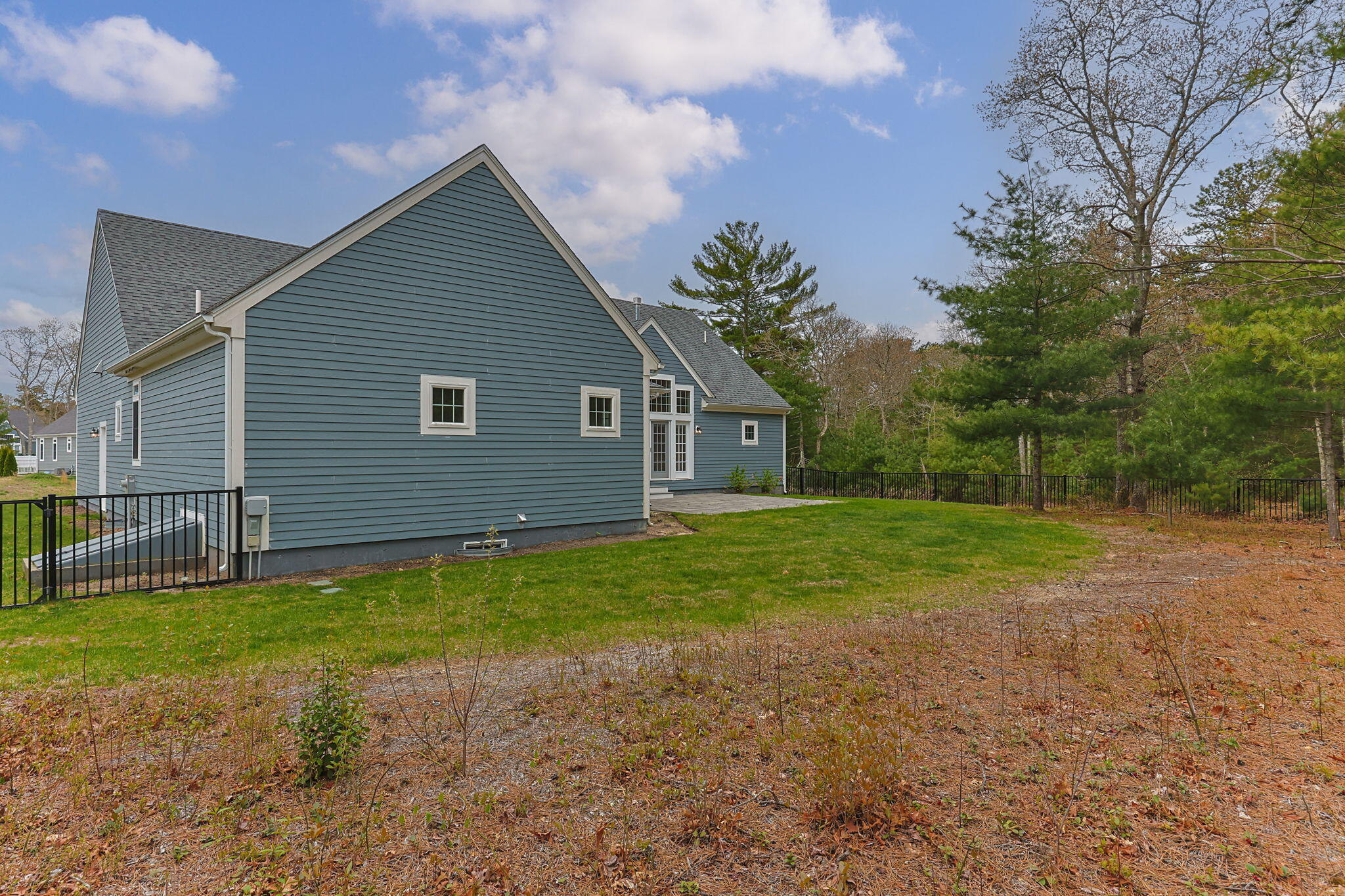 7 Nicklaus Way Mashpee, MA 02649 - Photo 38 of 45 a backyard of a house