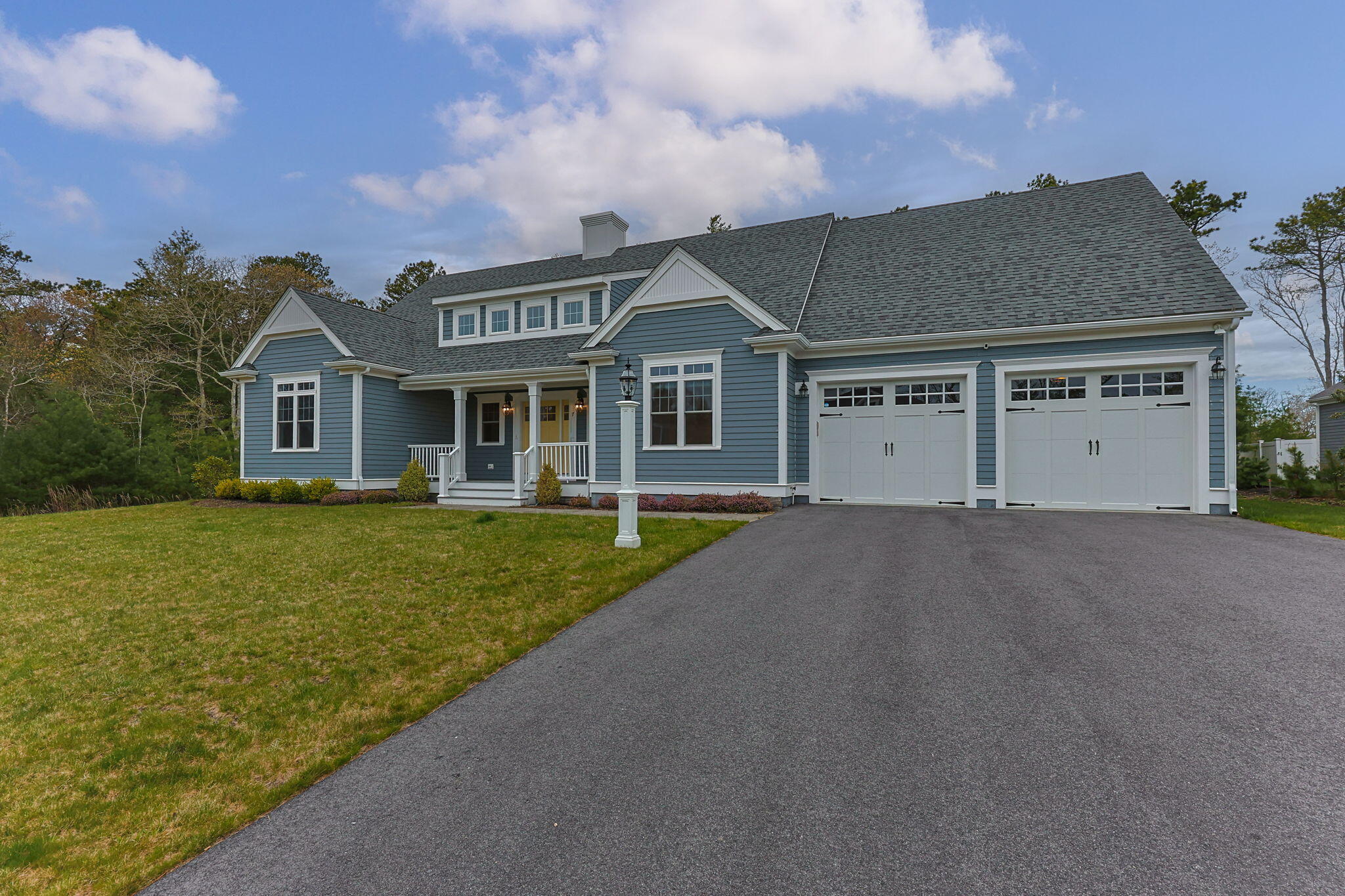 7 Nicklaus Way Mashpee, MA 02649 - Photo 41 of 45 front view of a house with a yard