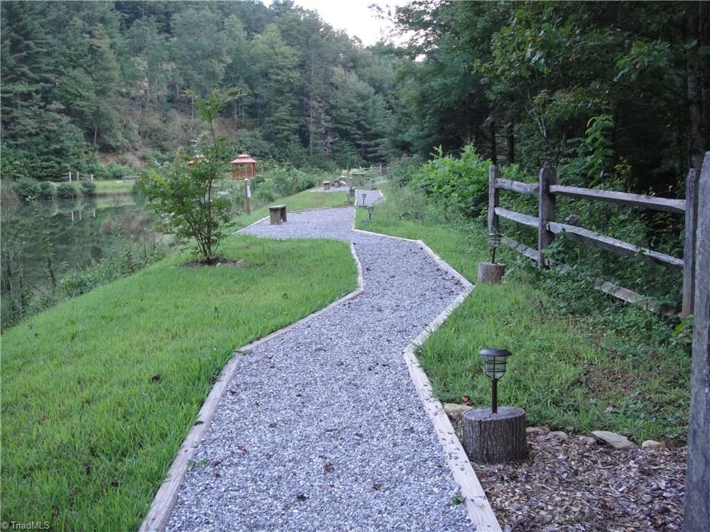 Lot 172 Blue Rock Road Purlear, NC 28665 - Photo 29 of 43 The Dawn R. Warren Memorial Garden located at The Pond at Deer Run.