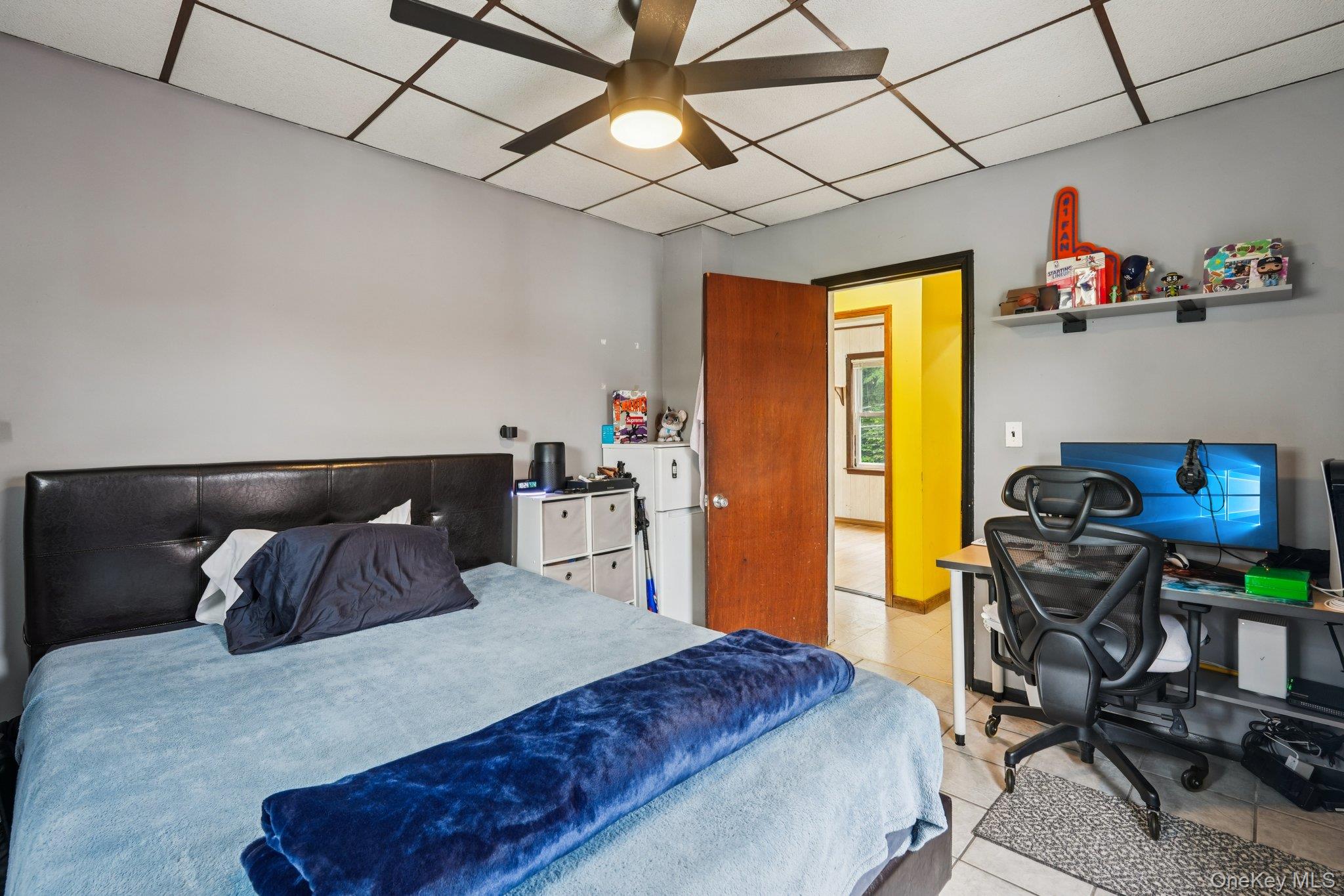 334 Union Avenue Peekskill, NY 10566 - Photo 14 of 20 a bedroom with a bed and a desk