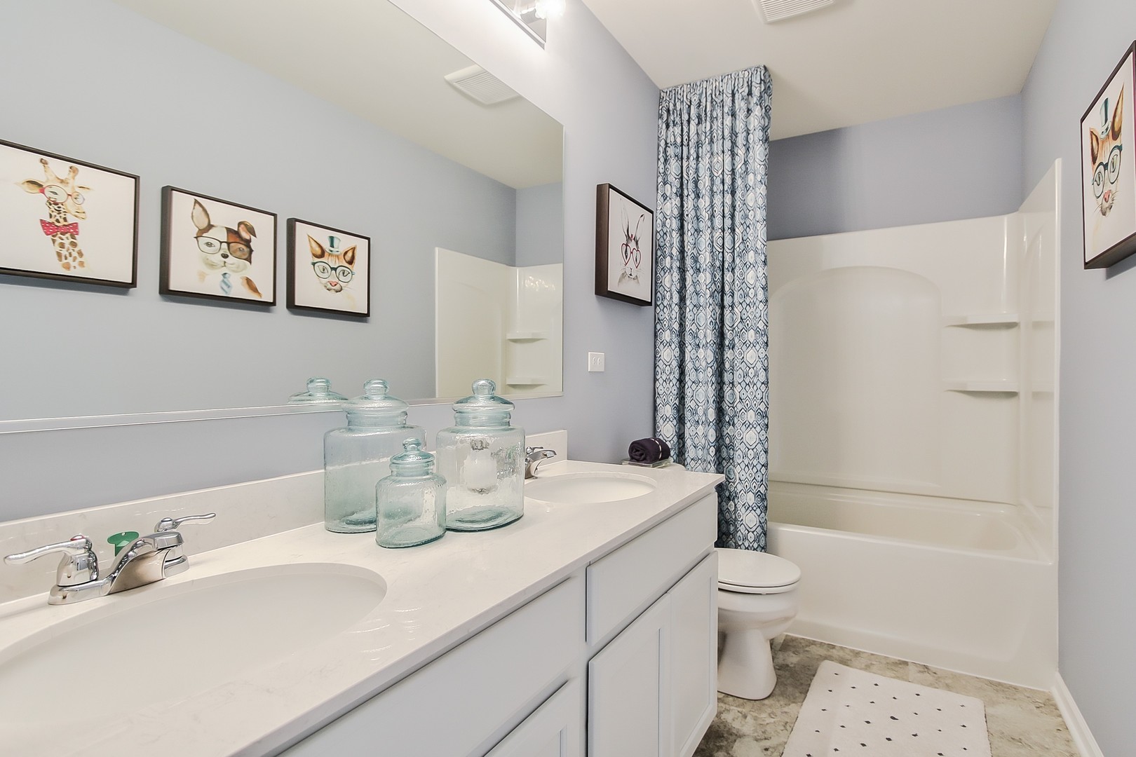 1671 Patterson Avenue North Aurora, IL 60542 - Photo 29 of 33 a bathroom with a sink a toilet and shower