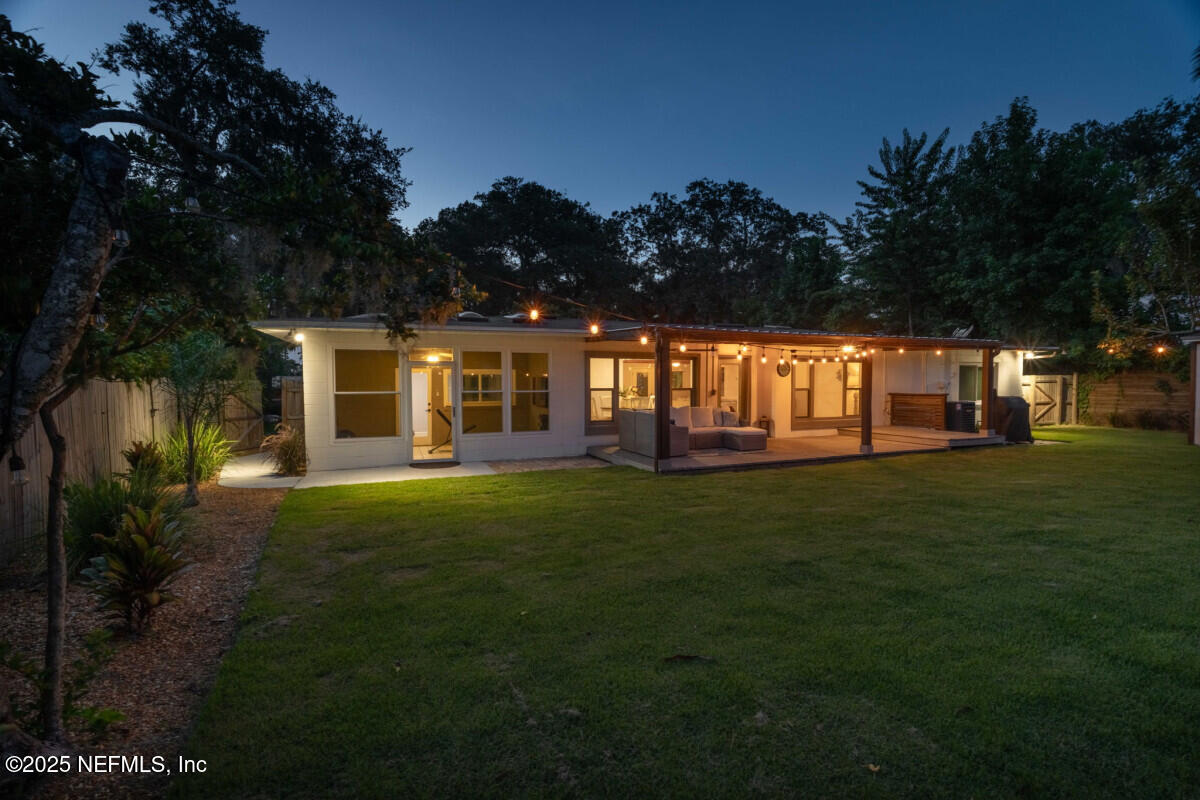 1901 Tanglewood Road Jacksonville Beach, FL 32250 - Photo 20 of 48 a view of a house with a big yard