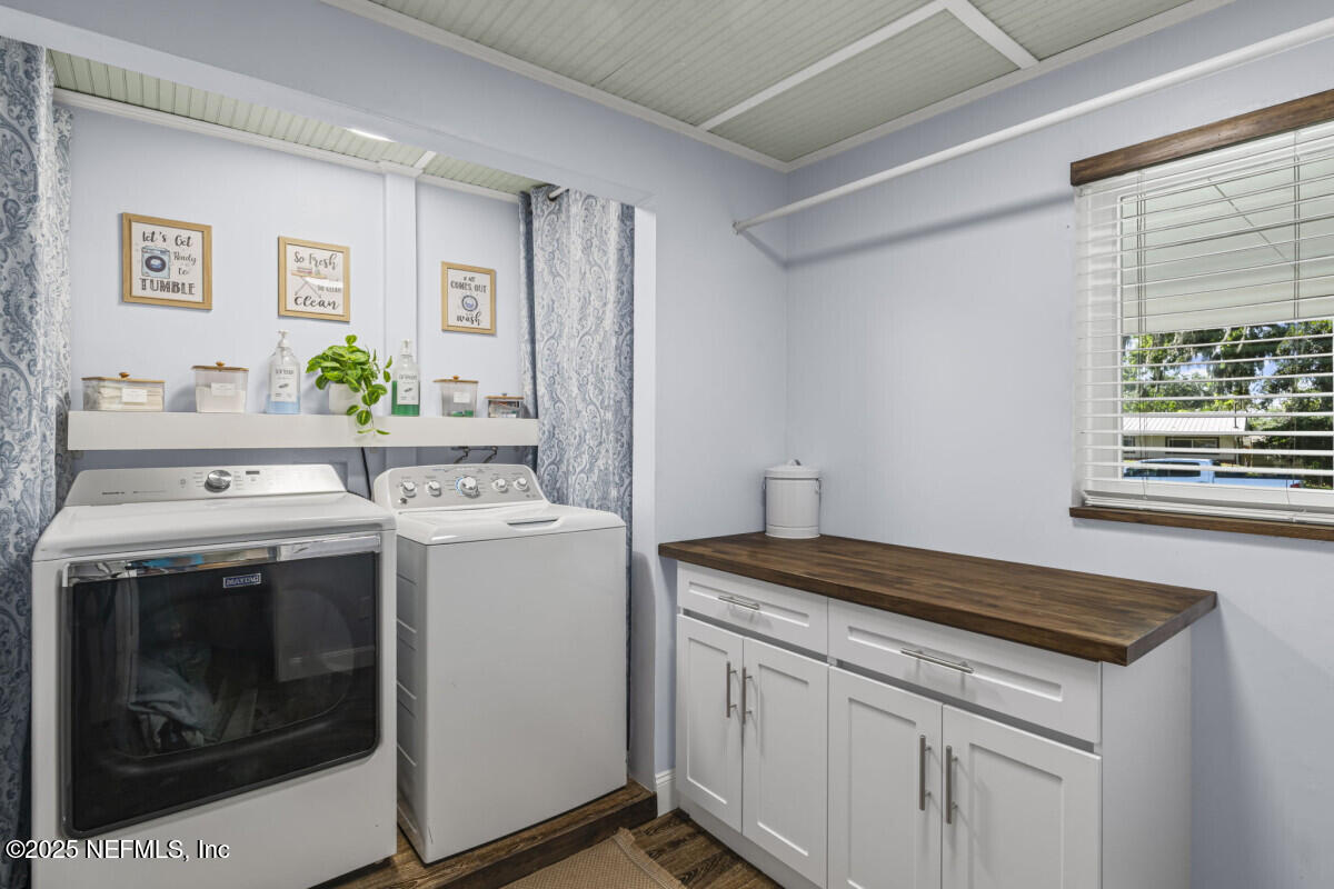 1901 Tanglewood Road Jacksonville Beach, FL 32250 - Photo 45 of 48 a utility room with dryer and washer
