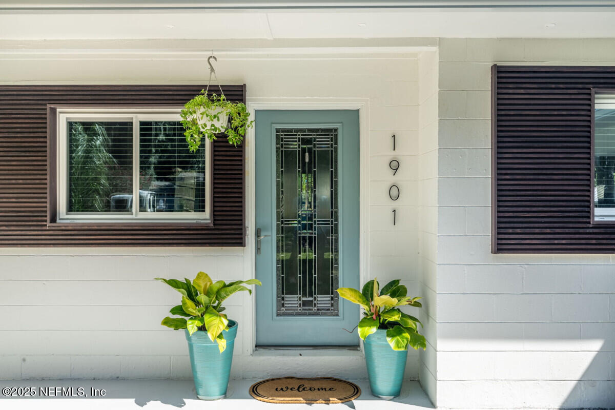 1901 Tanglewood Road Jacksonville Beach, FL 32250 - Photo 47 of 48 a view of a entryway door of the house