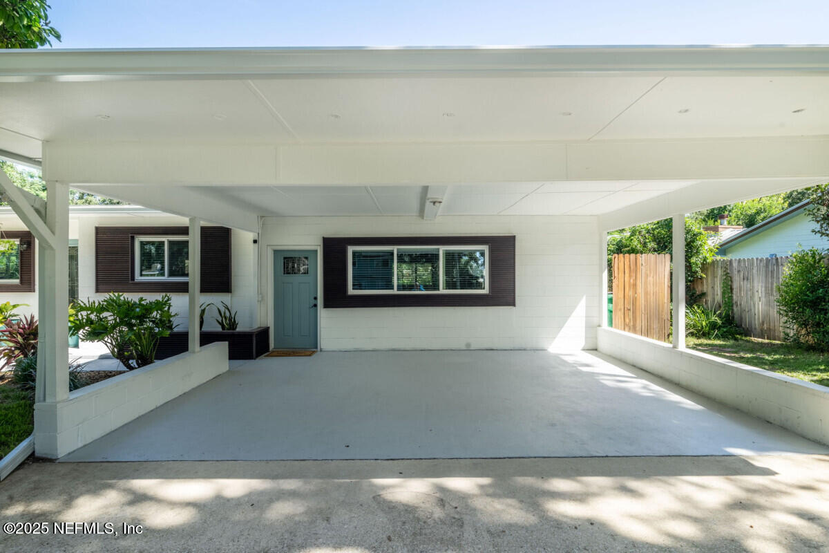 1901 Tanglewood Road Jacksonville Beach, FL 32250 - Photo 5 of 48 a view of a yard from a windows