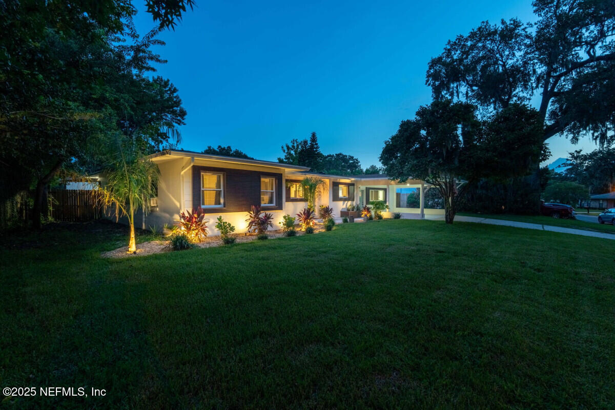1901 Tanglewood Road Jacksonville Beach, FL 32250 - Photo 6 of 48 a view of a house with a big yard