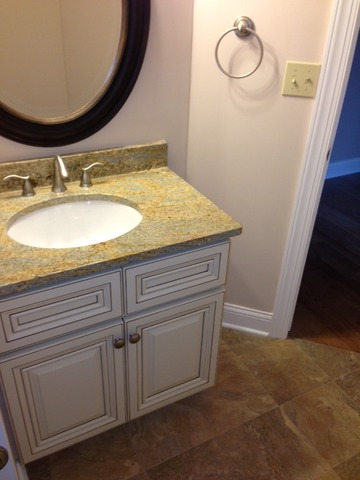 246 Highland Road Willowbrook, IL 60527 - Photo 4 of 6 a bathroom with a sink and a mirror