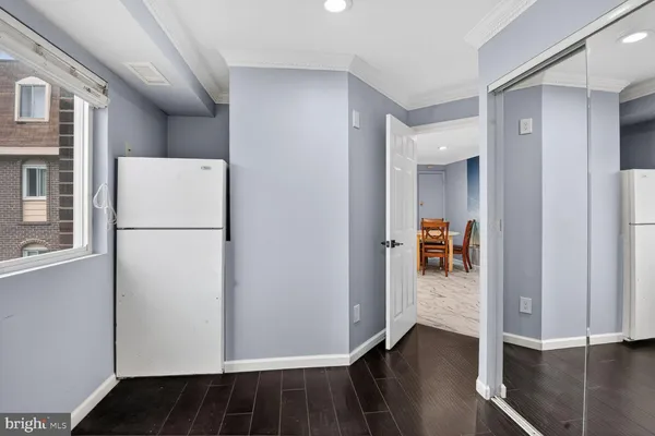 a bathroom with a toilet a sink and shower