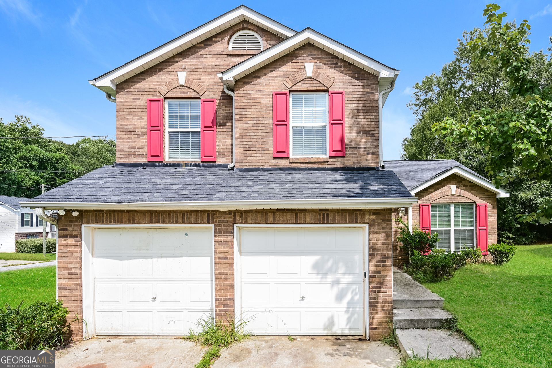 1837 Marceau Drive Conley, GA 30288 - Photo 1 of 1 a front view of a house with a yard