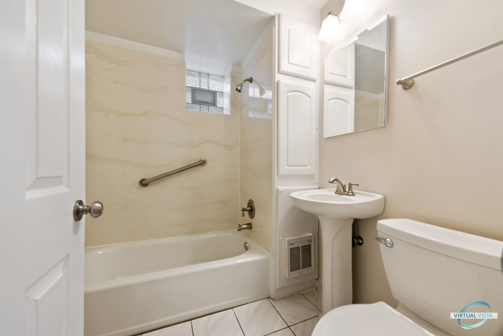 3510 South Union Avenue, Unit 1 Chicago, IL 60609 - Photo 16 of 18 a bathroom with a sink a toilet and bathtub