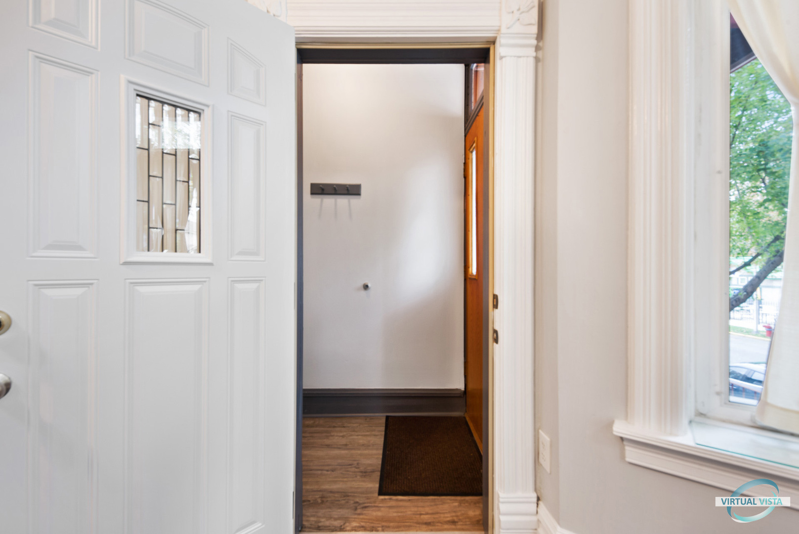 3510 South Union Avenue, Unit 1 Chicago, IL 60609 - Photo 2 of 18 a view of entryway with window and front door