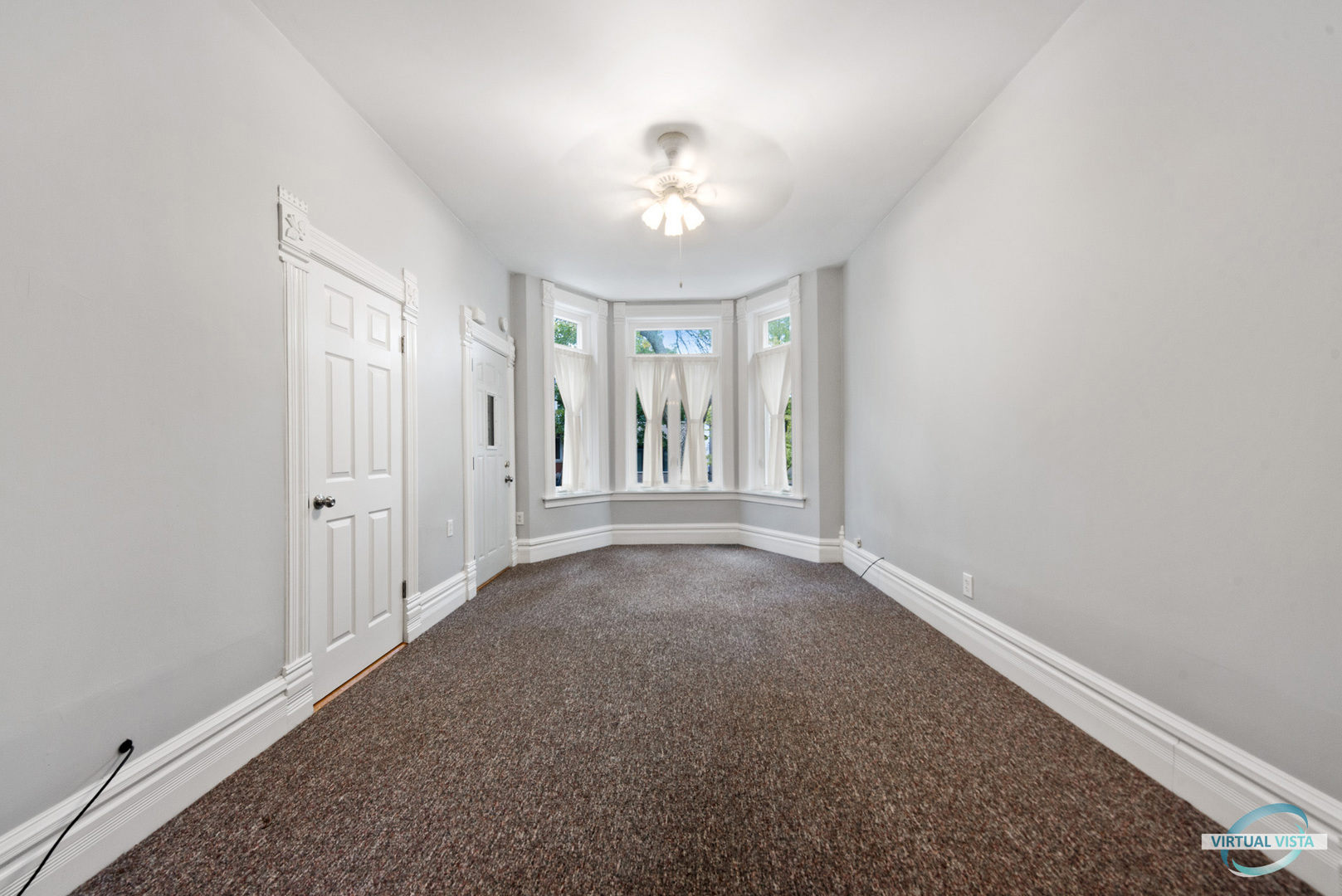 3510 South Union Avenue, Unit 1 Chicago, IL 60609 - Photo 3 of 18 a view of livingroom with hallway and chandelier