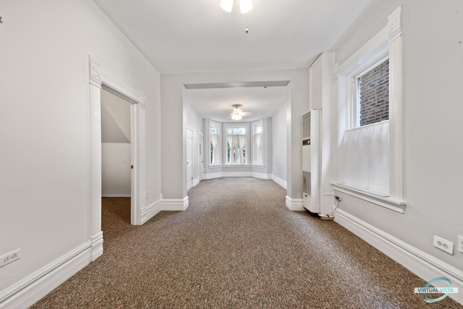 3510 South Union Avenue, Unit 1 Chicago, IL 60609 - Photo 5 of 18 a view of livingroom with entryway and window