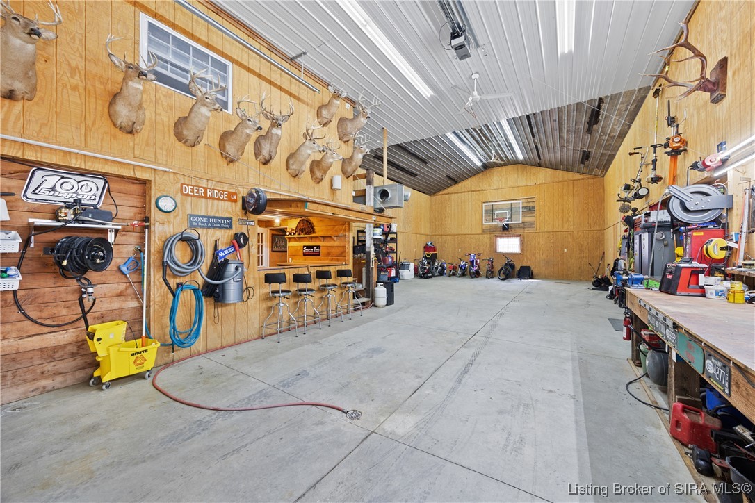 691 Locust Road Carrollton, KY 40045 - Photo 58 of 82 Enter the pole barn with bar--full bath --basketba