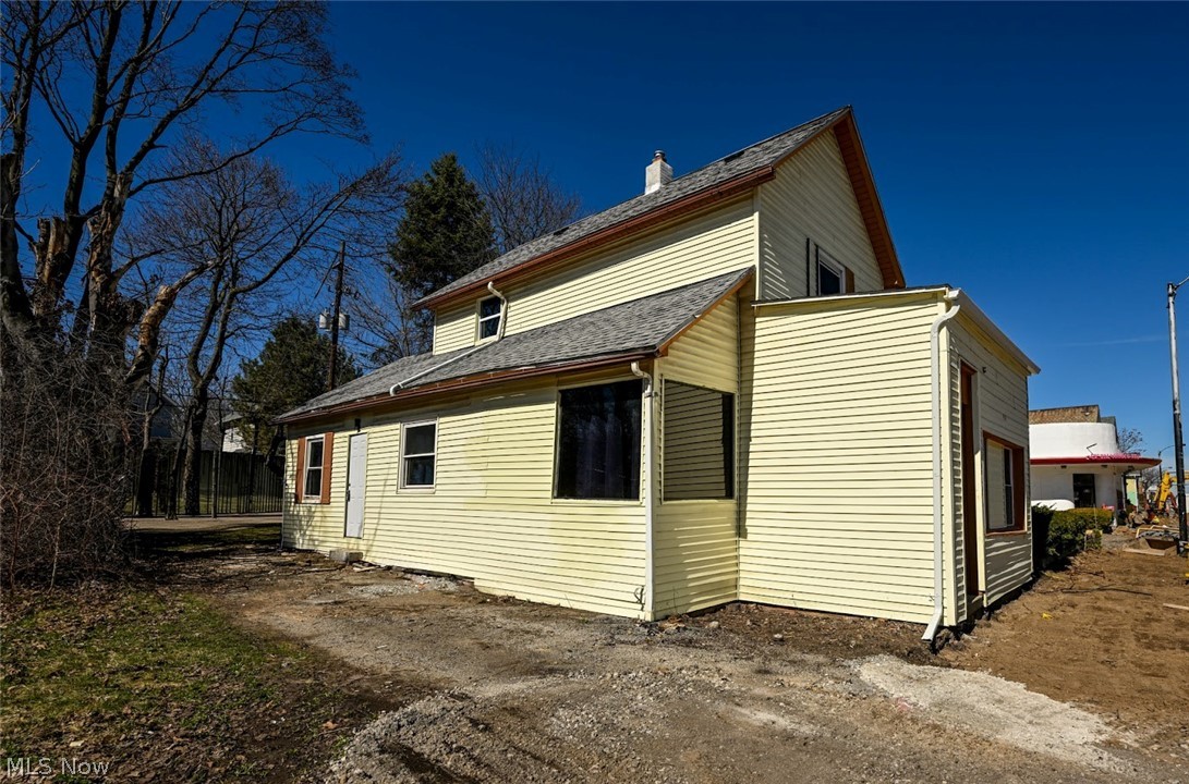 868 North Main Street Akron, OH 44310 - Photo 1 of 30 View of side of property with roof with shingles
