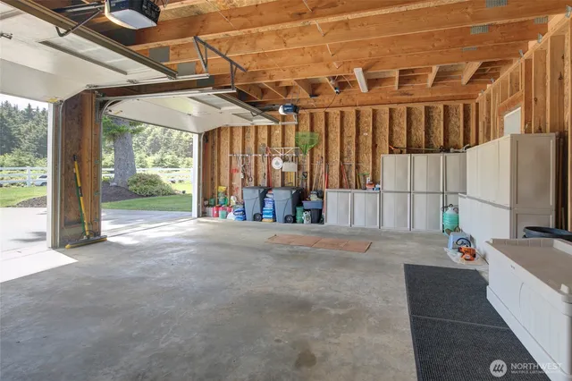 a view of porch with a table and chairs and floor to ceiling window