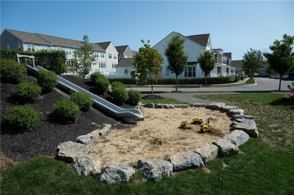 216 Oliver Way Cranberry Township, PA 16066 - Photo 27 of 30 a view of a house with a yard and a garden