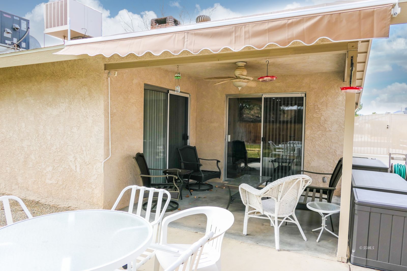 308 South Lilac Street Ridgecrest, CA 93555 - Photo 42 of 50 a view of a patio with table and chairs