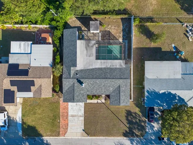 an aerial view of a house with garden