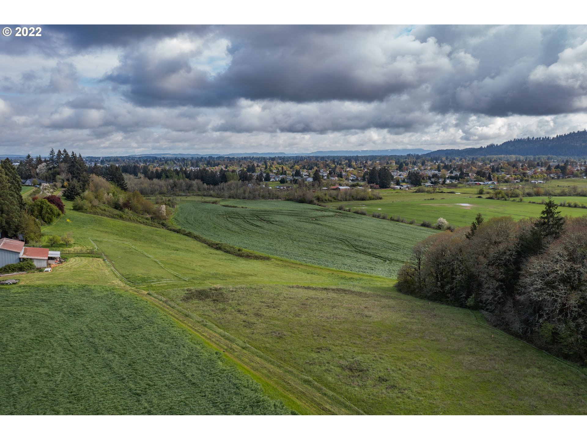 31721 Stoltz Hill Road Lebanon, OR 97355 - Photo 22 of 23 a view of a lake with a big yard