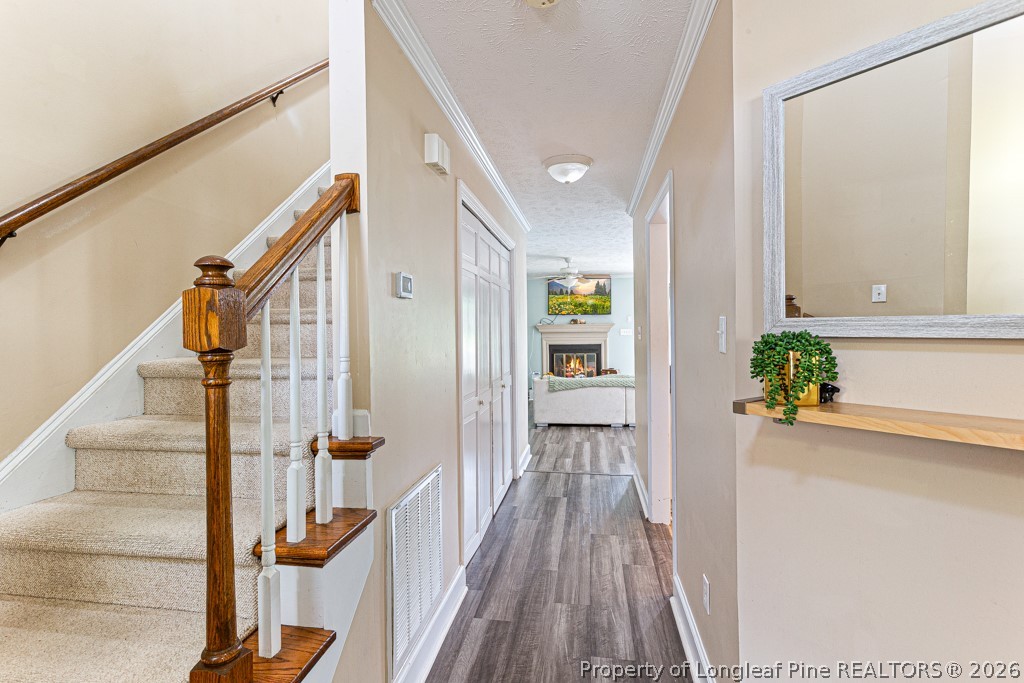 461 Lands End Road Fayetteville, NC 28314 - Photo 5 of 31 a view of entryway with wooden floor and stairs